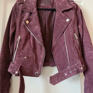 Purple suede jacket with silver zipper details. Size Small.